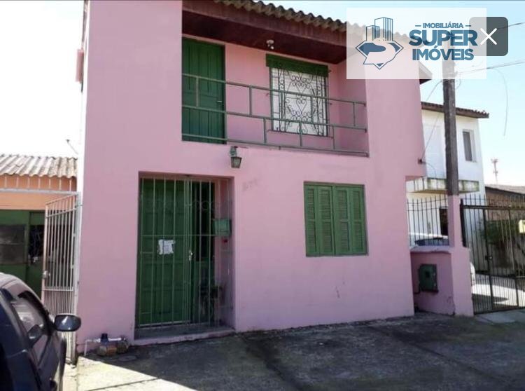 Casa a Venda no bairro Areal em Pelotas - RS. 3 banheiros, 3 dormitórios, 1 cozinha,  área de serviço,  copa,  sala de estar,  sala de jantar.  - 1252